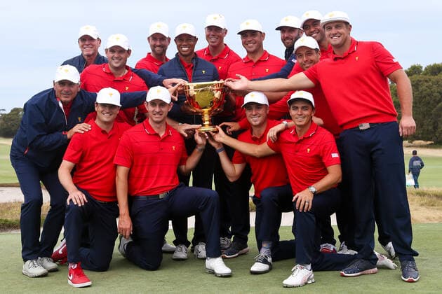 December 15, 2019, Victoria, Melbourne, Australila: (L-R top) Steve Stricker, Patrick Reed, Webb Simpson, Tiger Woods, Matt Kuchar, Gary Woodland, Dustin Johnson, Xander Schauffele, Tony Finau and Bryson DeChambeau. (L-R bottom) Fred Couples, Zach Johnson, Patrick Cantlay, Justin Thomas and Rickie Fowler with the trophy after beating the International team at the 2019 Presidents Cup at The Royal Melbourne Golf Club. Golf 2019: 2019 Presidents Cup: Final Round - ZUMAw109 20191215_zap_w109_001 Copyright: xDebbyxWongx