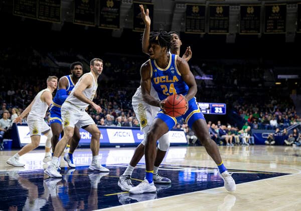 December 14, 2019: UCLA center Jalen Hill (24) drives to the basket as Notre Dame forward Juwan Durham (11) defends during NCAA, College League, USA Basketball game action between the UCLA Bruins and the Notre Dame Fighting Irish at Purcell Pavilion at the Joyce Center in South Bend, Indiana. Notre Dame defeated UCLA 75-61. CSM NCAA Basketball 2019: UCLA vs Notre Dame DEC 14 - ZUMAc04_ 20191214_zaf_c04_526 Copyright: xJohnxMersitsx