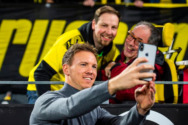 Football 1 Bundesliga, Season 2019 2020, 1 Matchday, Borussia Dortmund RB Leipzig on 17 12 2019 at Signal Iduna Park in Dortmund North Rhine-Westphalia Leipzigs coach Julian Nagelsmann makes a selfie with Dortmund fans DFL REGULATIONS PROHIBIT ANY USE OF PHOTOGRAPHS AS IMAGE SEQUENCES AND OR QUASI VIDEO Copyright: xKirchner-Media Neundorfx