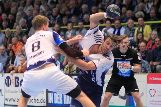 2 Bundesliga Handball VfL Luebeck Schwartau TSV Bayer Dormagen 20 12 2019, Hansehalle Luebeck, GER, 2 Bundesliga Handball VfL Luebeck Schwartau TSV Bayer Dormagen in the picture picture picture shows Markus Hansen VfL Luebeck Schwartau in the duel against Andre Meuser TSV Bayer Dormagen nordphotox xTauchnitz nph00059