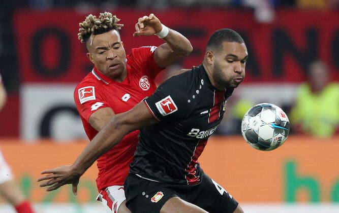 Pierre Kunde Malong 14, Mainz 05 , Jonathan Tah 4, Leverkusen , Soccer, 1 Bundesliga 1 FSV Mainz 05 Bayer 04 Leverkusen, 17 Matchday on 21 12 2019, Season 2019 20, ,m05, ZmdZ, According to the rules of the DFL Deutsche Fußball Liga it is prohibited to use or have used photographs taken in the stadium and or of the match in the form of sequence images and or video-like photo sequences DFL regulations prohibit any use of photographs as image sequences and or quasi video 1 FSV Mainz 05 Bayer 04 Leverkusen