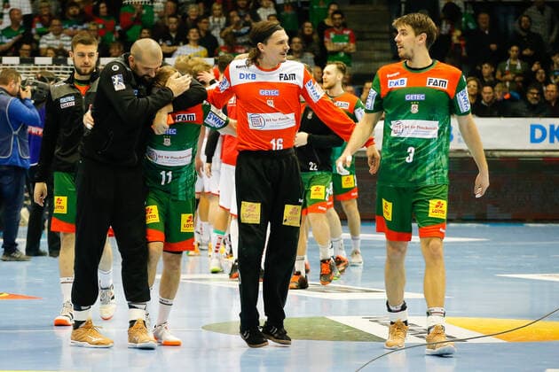 22 12 2019, xgox, Handball Liqui Moly HBL, SC Magdeburg MT Melsungen emspor, from l Zeljko Musa Magdeburg, 2 , Daniel Pettersson Magdeburg, 11 , Jannick Green Krejberg Magdeburg, 16 , Piotr Chrapkowski Magdeburg, 3 Cheers for the victory, cheers after the end of the game GETEC Arena