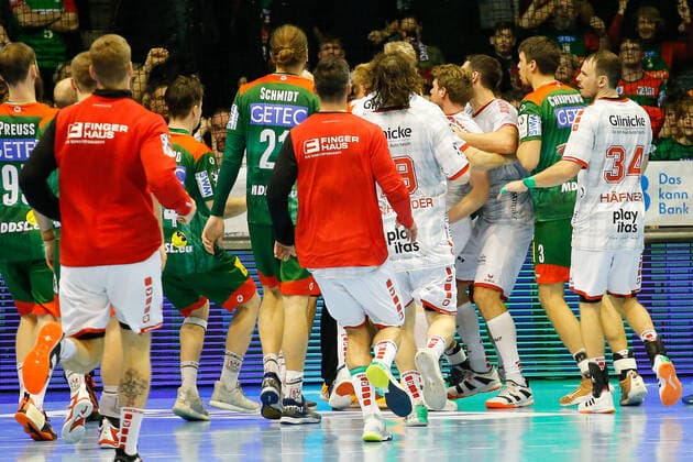 22 12 2019, xgox, Handball Liqui Moly HBL, SC Magdeburg MT Melsungen emspor, v l players of both teams clash, duel, fight, tackle GETEC Arena