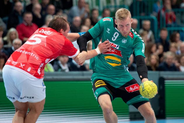 Minden, Germany 22 12 2019 1 Handball Bundesliga 2019 2020 GWD Minden vs Bergischer HC L R Max Darj Bergischer HC , Christoffer Rambo Minden Minden Minden North Rhine-Westphalia Germany Kampa Halle