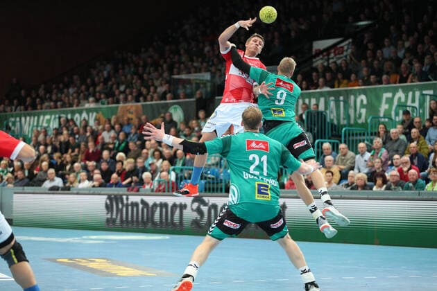 Max Darj Bergischer HC 5 against Christoffer Rambo TSV GWD Minden 9 right , Magnus Gullerud TSV GWD Minden 21 front GER, Handball, 1 Bundesliga, TSV GWD Minden against Bergischer HC, 22 12 2019 Minden Copyright: xStrohdiekx Eibner-Pressefotox EP_jsk