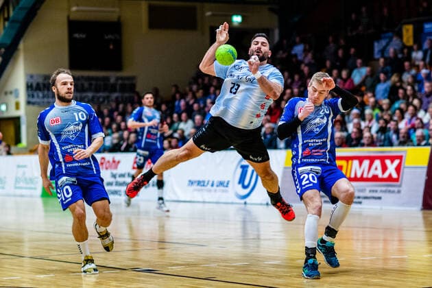 vlr Vincent Sohmann 10 Dessau Rosslauer HV 06 , Nikolaos Tzoufras 23 Eintracht Hildesheim , Slavomir Mlotek 20 Dessau Rosslauer HV 06 during the match in the 3 League North East Men Handball Season 2019 2020 between Dessau Rosslauer HV 06 and Eintracht Hildesheim in the Anhalt Arena on 22 December 2019 in Dessau Rosslau, Saxony Anhalt, Germany