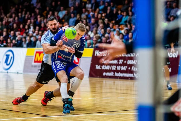 Nikolaos Tzoufras 23 Eintracht Hildesheim , Slavomir Mlotek 20 Dessau Rosslauer HV 06 during the match in the 3 League North East Men Handball Season 2019 2020 between Dessau Rosslauer HV 06 and Eintracht Hildesheim in the Anhalt Arena on 22 December 2019 in Dessau Rosslau, Saxony Anhalt, Germany