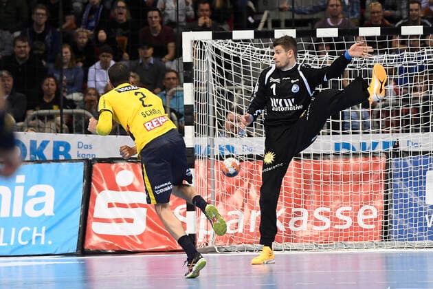 Handball Bundesliga 19 Matchday Bergischer HC Rhein Neckar Löwen on 26 12 2019 at the ISS Dome in Düsseldorf Rhein Neckar Löwe Andy Schmid Nr 2 converts a seven-meter against BHCs goalkeeper Christopher Rudek Nr 1 WD