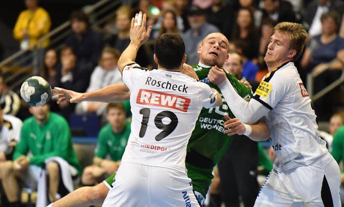 Paul Drux Füchse at the two kmapf with Franz Semper Leipzig , left Alen Milosevic Leipzig , Füchse Berlin SC DHFK Leipzig 1 Bundesliga, DKB Handballbundesliga, 2019 2020 Men, Men, Men, Handball, Germany, Germany, Max Schmeling Halle Berlin, 26 12 2019
