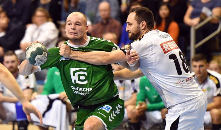 Paul Drux Füchse mirt BVall, right Philipp Müller Leipzig , Füchse Berlin SC DHFK Leipzig 1 Bundesliga, DKB Handballbundesliga, 2019 2020 Men, Men, Men, Handball, Germany, Germany, Max Schmeling Halle Berlin, 26 12 2019