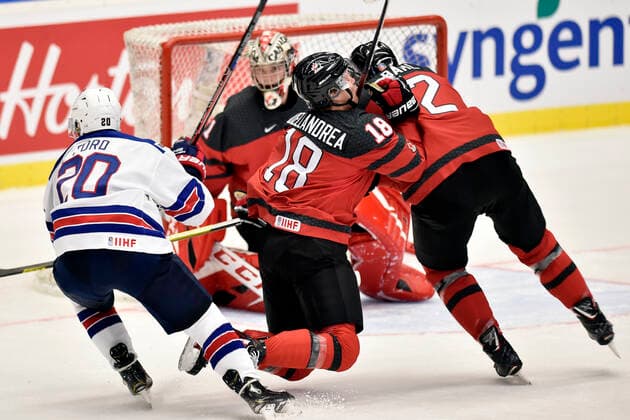 (L-R) Parker Ford of USA, Nico Daws, Ty Dellandrea and Kevin Bahl of Canada in action during the 2020 IIHF World Junior Ice hockey, Eishockey Championships Group B match between Canada and USA in Ostrava, Czech Republic, on December 26, 2019. (CTKxPhoto JaroslavxOzana) CTKPhotoP201912260455401  JAO 04