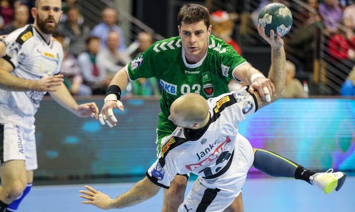 26 12 2019, Handball, 1 Bundesliga, 19 Matchday, Füchse Berlin SC DHfK Leipzig, Max Schmeling Halle Berlin Mijajlo Marsenic M stops goal throw by Maximilian Janke r of Leipzig Handball 1 Bundesliga Füchse Berlin SC DHfK Leipzig
