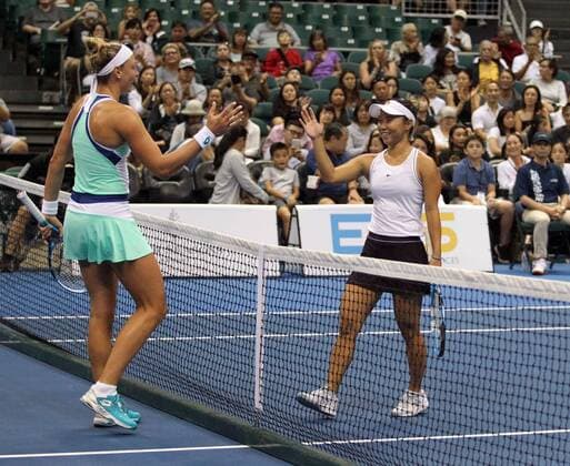 December 26, 2019 - Players shake hands after Wickmayer won the match 6-1, 6-1 during the Hawaii Open invitational tournament match between 152nd ranked Yanina Wickmayer (Belgium) and unranked local product Alyssa Tobita (USA) of Mililani and University of Oregon alum at the Stan Sheriff Center in Honolulu, HI - CSM. Tennis 2019: Hawaii Open DEC26 - ZUMAc04_ 20191226_zaf_c04_096 Copyright: xMichaelxSullivanx