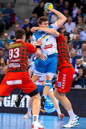 Stuttgart, Germany 29 December 2019 HBL 19 20 TVB 1898 Stuttgart vs. Füchse Berlin v li Mijajlo Marsenic Berlin , Dominik Weiss Stuttgart , Marko Kopljar Berlin Stuttgart Porsche Arena Baden Württemberg Germany