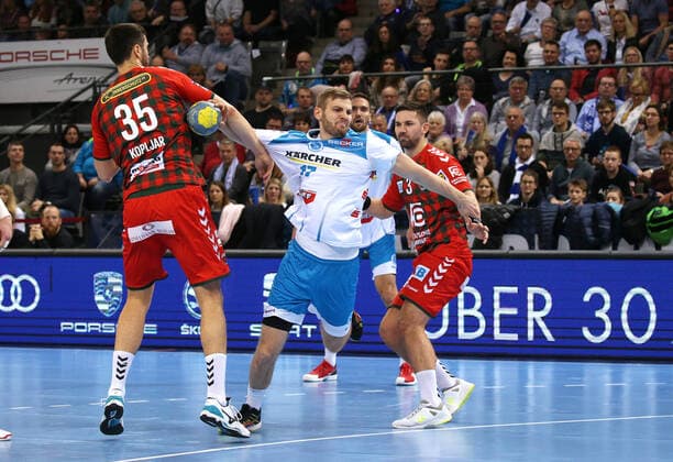 29 12 2019, Germany, Stuttgart, Handball 1 Bundesliga Season 2019 2020 TVB 1898 Stuttgart vs. Füchse Berlin v l Marko Kopljar Berlin , Samuel Röthlisberger TVB , Fabian Wiede Berlin ,