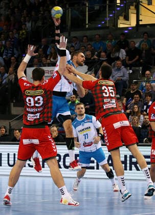 29 12 2019, Germany, Stuttgart, Handball 1 Bundesliga Season 2019 2020 TVB 1898 Stuttgart vs. Füchse Berlin v l Mijajlo Marsenic Berlin , Dominik Weiß TVB , Marko Kopljar Berlin