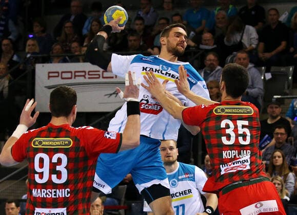 29 12 2019, Germany, Stuttgart, Handball 1 Bundesliga Season 2019 2020 TVB 1898 Stuttgart vs. Füchse Berlin v l Mijajlo Marsenic Berlin , Dominik Weiß TVB , Marko Kopljar Berlin