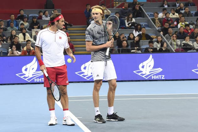 December 30, 2019, Zhejiang, Zhejiang, China: Zhejiang,CHINA-Switzerland s Roger federer and Germany s Alexander zverev VS America s Bob blaine mike blaine during the 2019 Tmall cup invitational tennis tournament at the Olympic sports center in Hangzhou, east China s Zhejiang province, Dec. 28, 2019.Federer and Zvelev lost 0-2 to their opponents. Hangzhou international tennis invitational tournament: federer s debut  - ZUMAs145 20191230_zaa_s145_092 Copyright: xZhanxYux