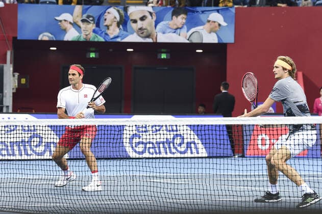 December 30, 2019, Zhejiang, Zhejiang, China: Zhejiang,CHINA-Switzerland s Roger federer and Germany s Alexander zverev VS America s Bob blaine mike blaine during the 2019 Tmall cup invitational tennis tournament at the Olympic sports center in Hangzhou, east China s Zhejiang province, Dec. 28, 2019.Federer and Zvelev lost 0-2 to their opponents. Hangzhou international tennis invitational tournament: federer s debut  - ZUMAs145 20191230_zaa_s145_097 Copyright: xZhanxYux