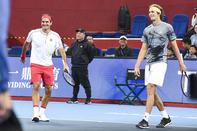 December 30, 2019, Zhejiang, Zhejiang, China: Zhejiang,CHINA-Switzerland s Roger federer and Germany s Alexander zverev VS America s Bob blaine mike blaine during the 2019 Tmall cup invitational tennis tournament at the Olympic sports center in Hangzhou, east China s Zhejiang province, Dec. 28, 2019.Federer and Zvelev lost 0-2 to their opponents. Hangzhou international tennis invitational tournament: federer s debut  - ZUMAs145 20191230_zaa_s145_101 Copyright: xZhanxYux