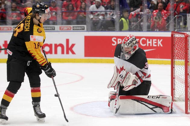 L-R TARO JENTZSCH of Germany and goalie JOEL HOFER of Canada in action during the 2020 IIHF World Junior Ice hockey, Eishockey Championships Group B match between Germany and Canada in Ostrava, Czech Republic, on December 30, 2019. (CTKxPhoto PetrxSznapka) CTKPhotoP201912300561501  SZN 25K