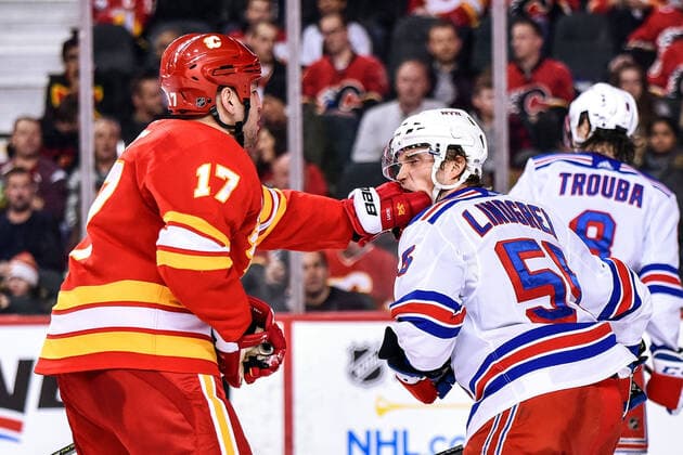 Bilder des Jahres 2020, Sport 01 Januar Sport Themen der Woche KW01 Sport Bilder des Tages CALGARY, AB - JANUARY 02: Calgary Flames Left Wing Milan Lucic (17) punches New York Rangers Defenceman Ryan Lindgren (55) in the mouth during the third period of an NHL, Eishockey Herren, USA game where the Calgary Flames hosted the New York Rangers on January 2, 2020, at the Scotiabank Saddledome in Calgary, AB. (Photo by Brett Holmes Icon Sportswire) NHL: JAN 02 Rangers at Flames Icon200102032
