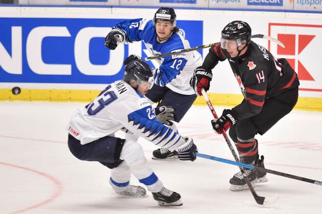 L-R VILLE PETMAN, EEMIL ERHOLTZ, both of Finlad and JARED MCISAAC of Canada in action during the 2020 IIHF World Junior Ice hockey, Eishockey Championships semifinal match between Canada and Finland in Ostrava, Czech Republic, on January 4, 2020. (CTKxPhoto JaroslavxOzana) CTKPhotoP202001040490701  JAO 09