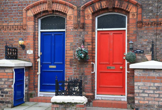 5th January 2020; Anfield, Liverpool, Merseyside, England; English FA Cup Football, Liverpool versus Everton; adjacent red and blue front doors on terraced houses in Wylva Road, a few hundred yards from the Kop - Strictly Editorial Use Only. No use with unauthorized audio, video, data, fixture lists, club league logos or live services. Online in-match use limited to 120 images, no video emulation. No use in betting, games or single club league player publications  ActionPlus12201064 DavidxBlunsden