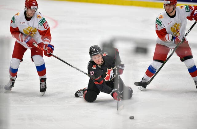(L-R) Pavel Dorofeyev of Russia, Ty Dellandrea of Canada and Ivan Morozov of Russia in action during the 2020 IIHF World Junior Ice hockey, Eishockey Championships final game between Russia and Canada in Ostrava, Czech Republic, on January 5, 2020. (CTKxPhoto JaroslavxOzana) CTKPhotoP202001050601001  _JAO8016