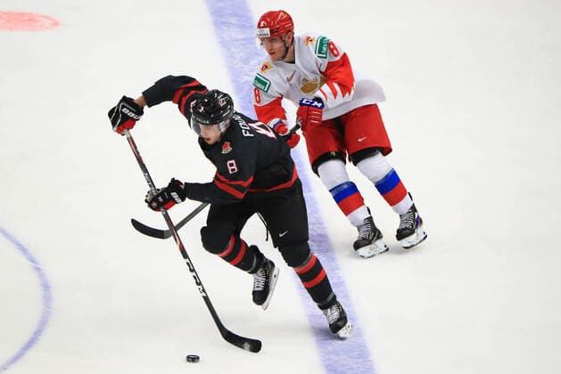 OSTRAVA, CZECH REPUBLIC - JANUARY 5, 2020: Canada s Liam Foudy (L) and Russia s Ivan Morozov in the 2020 World Junior Ice hockey, Eishockey Championship final match between Canada and Russia at Ostravar Arena. Peter Kovalev TASS  TS0C97E3