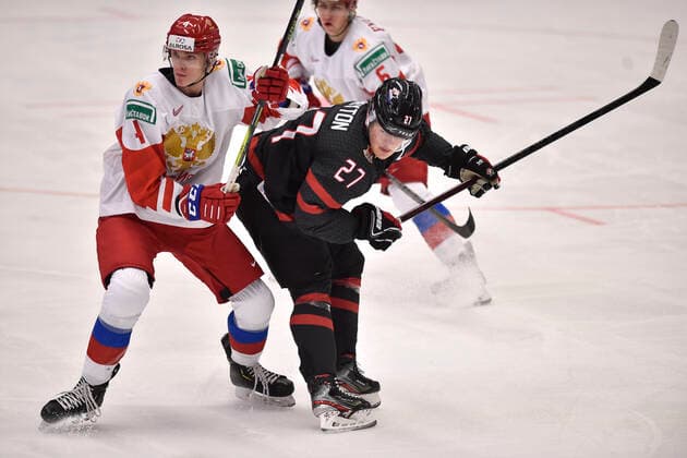 Yegor Zamula of Russia, left, and Barrett Hayton of Canada in action during the 2020 IIHF World Junior Ice hockey, Eishockey Championships final game between Russia and Canada in Ostrava, Czech Republic, on January 5, 2020. (CTKxPhoto JaroslavxOzana) CTKPhotoP202001050632301  JAO 05