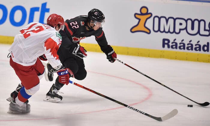 Ilya Kruglov of Russia, left, and Dylan Cozens of Canada in action during the 2020 IIHF World Junior Ice hockey, Eishockey Championships final game between Russia and Canada in Ostrava, Czech Republic, on January 5, 2020. (CTKxPhoto JaroslavxOzana) CTKPhotoP202001050681201  JAO 12