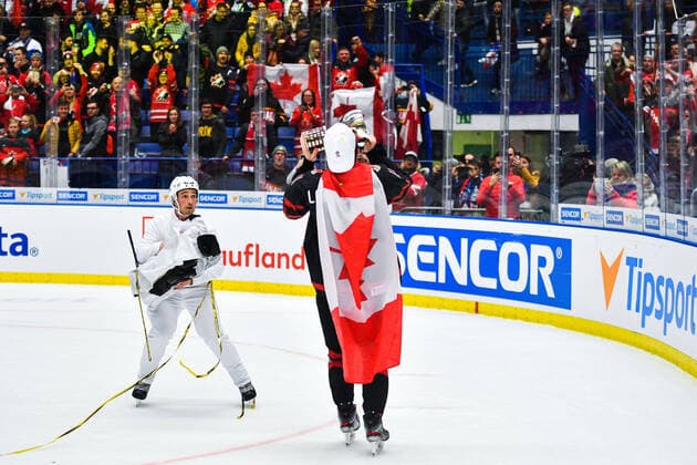 200105 Alexis Lafreniere of Canada celebrate with the trophy and a Canadian flag after the 2020 IIHF World Junior Championship gold medal game between Canada and Russia on January 5, 2020 in Ostrava Photo Simon Hastegard BILDBYRAN kod SH 180176 ishockey ice hockey u20 jvm jvm 2020 jvm 19 20 iihf world junior championship world juniors bbeng final kanada ryssland jubel,  Copyright: SIMONxHASTEGARD BB200105ZT022