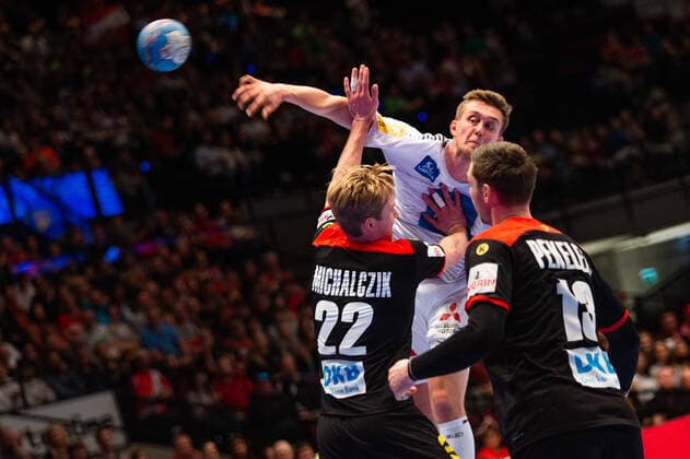 HANDBALL - AUT vs GER, test match VIENNA,AUSTRIA,06.JAN.20 - HANDBALL - OEHB international match, Länderspiel, Nationalmannschaft Austria vs Germany, test match. Image shows Nikola Bilyk (AUT), Marian Michalczik and Hendrik Pekeler (GER). GEPAxpictures xDavidxBitzan