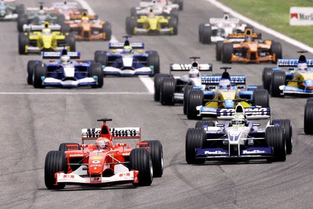 SCHUMACHER Michael F1 Team Scuderia Ferrari in front of brother SCHUMACHER Ralf F1 Team BMW at the start GP of Spain 2002 in Barcelona on 28 04 2002 in Barcelona