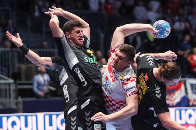 Croatia vs Montenegro: Group A - Men s EHF EURO 2020 GRAZ, AUSTRIA - JANUARY 09: Marin Sipic of Croatia is challenged by Aleksandar Bakic of Montenegro during the Men s EHF EURO 2020 group A match between Croatia and Montenegro at Stadthalle on January 9, 2020 in Graz, Austria.  LukaxStanzl PIXSELL