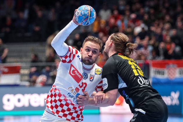 Croatia vs Montenegro: Group A - Men s EHF EURO 2020 GRAZ, AUSTRIA - JANUARY 09: Luka Cindric of Croatia is challenged by Mirko Radovic of Montenegro during the Men s EHF EURO 2020 group A match between Croatia and Montenegro at Stadthalle on January 9, 2020 in Graz, Austria.  LukaxStanzl PIXSELL