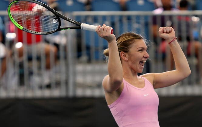 ADELAIDE INTERNATIONAL DAY 1, Simona Halep of Romania reacts during an interview with Roger Rashid against Angelique Kerber of Germany and Robert Farah of Columbia during the Adelaide International Rally for Resilience exhibition game on day 1 of the Adelaide International tennis tournament atMemorial Drive Tennis Centre inAdelaide, Sunday, January 12, 2020. ( NO ARCHIVING, EDITORIAL USE ONLY, NO USE IN BOOKS WITHOUT CONSENT ADELAIDE SA AUSTRALIA  Copyright: xKELLYxBARNESx 20200112001441698453