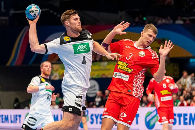 Handball, Men EM 2020, Main Round, Group 1, Belarus Germany from left Johannes Golla Germany SG Flensburg , Uladzislau Kulesh Belarus Vienna Stadthalle Vienna Austria