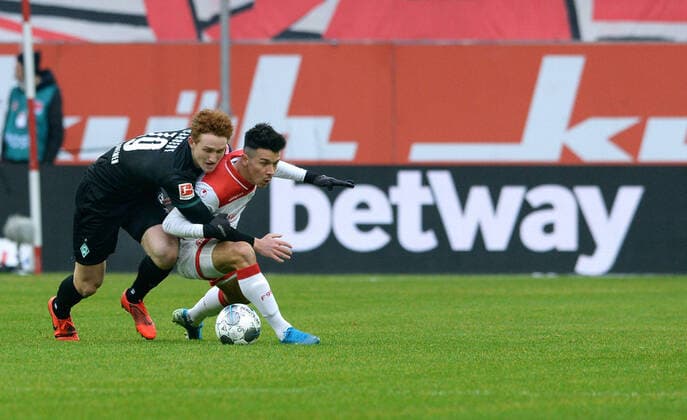 Football, Bundesliga, Germany, Men, Season 2019 2020, 18 Matchday, Merkur Spiel Arena Düsseldorf, Fortuna Düsseldorf, F95 white SV Werder Bremen black 0 1 Alfredo Morales F95 , Joshua Sargent SVW in front of the Betway advertising board Advertising, Sponsor, Economy, Advertising object, Advertising board, Sports betting DFB DFL REGULATIONS PROHIBIT ANY USE OF PHOTOGRAPHS AS IMAGE SEQUENCES AND OR QUASI VIDEO