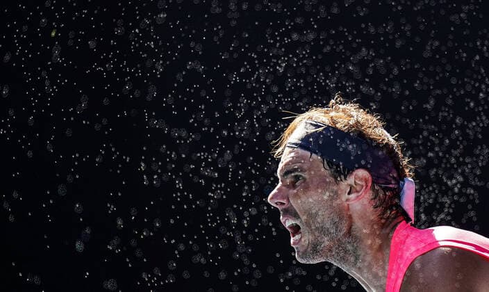 Bilder des Jahres 2020, Sport 01 Januar Sport Themen der Woche KW04 AUSTRALIAN OPEN DAY 6, Sweat from Rafael Nadal of Spain flies in the air as he serves during his third round match against Pablo Carreno Busta of Spain on day six of the Australian Open tennis tournament at Rod Laver Arena in Melbourne, Saturday, January 25, 2020. ( NO ARCHIVING, EDITORIAL USE ONLY, NO USE IN BOOKS WITHOUT CONSENT MELBOURNE VIC AUSTRALIA  Copyright: xSCOTTxBARBOURx 20200126001444447465