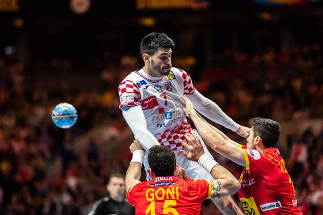 200126 Luka Stepanic of Croatia and Iousu Goni Leoz of Spain during the EHF European Handball Championship final between Spain and Croatia on January 26, 2020 in Stockholm,  Copyright: JOHANNAxLUNDBERG BB200126JL008
