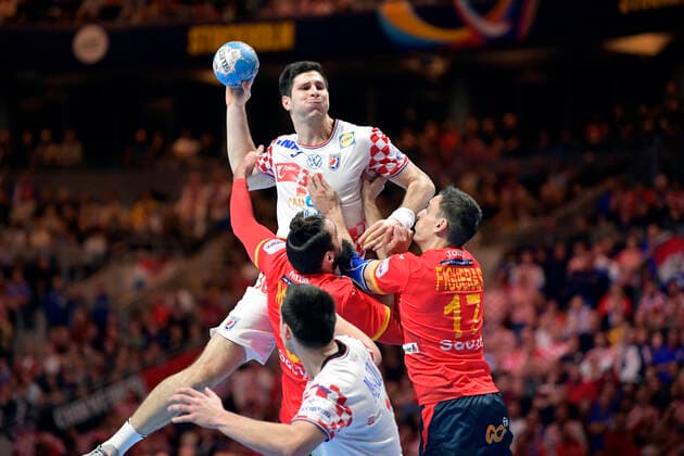 Croatia s Marino Maric with the ball against Spain s Jorge Maqueda Pena L and Adrian Figueras Trejo 17 during the Men s European Handball Championship final match between Spain and Croatia in Stockholm, Sweden, on Jan 26, 2020 Stockholm Sverige HANDBALL x10040x,  Copyright: xAndersxWiklund TTx EHF HANDBALL FINAL ESP-CRO