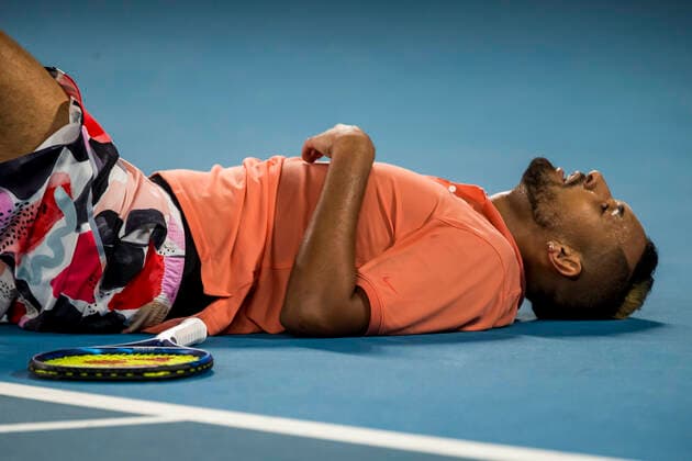 MELBOURNE, VIC - JANUARY 27: Nick Kyrgios of Australia collapses after losing a point during the fourth round of the 2020 Australian Open on January 27 2020, at Melbourne Park in Melbourne, Australia. (Photo by Jason Heidrich Icon Sportswire) TENNIS: JAN 27 Australian Open Icon2001271858
