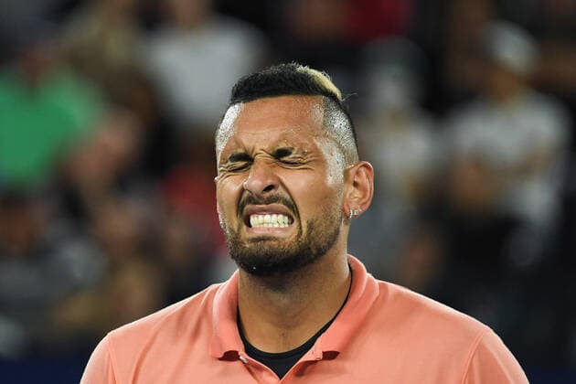 (200127) -- MELBOURNE, Jan. 27, 2020 -- Nick Kyrgios of Australia reacts during the Men s Singles 4th Round match between Rafael Nadal of Spain and Nick Kyrgios of Australia at the Australian Open tennis championship in Melbourne, Australia, Jan. 27, 2020. (Photo by Xinhua) (SP)AUSTRALIA-MELBOURNE-TENNIS-AUSTRALIAN OPEN-DAY 8 BaixXue 