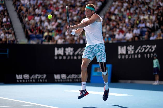 AUSTRALIAN OPEN DAY 9, Tennys Sandgren of the USA plays a return shot during his fifth round match against Roger Federer of Switzerland on day nine of the Australian Open tennis tournament at Rod Laver Arena in Melbourne, Tuesday, January 28, 2020. ( NO ARCHIVING, EDITORIAL USE ONLY, NO USE IN BOOKS WITHOUT CONSENT MELBOURNE VIC AUSTRALIA  Copyright: xMICHAELxDODGEx 20200128001445160782