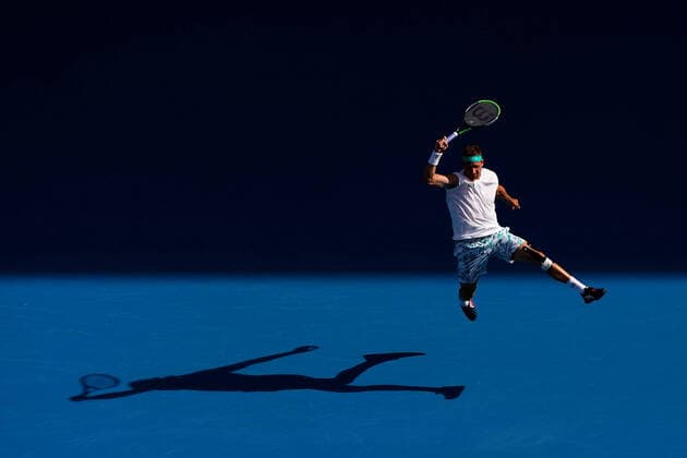 AUSTRALIAN OPEN DAY 9, Tennys Sandgren of the USA plays a return shot during his fifth round match against Roger Federer of Switzerland on day nine of the Australian Open tennis tournament at Rod Laver Arena in Melbourne, Tuesday, January 28, 2020. ( NO ARCHIVING, EDITORIAL USE ONLY, NO USE IN BOOKS WITHOUT CONSENT MELBOURNE VIC AUSTRALIA  Copyright: xSCOTTxBARBOURx 20200128001445163507