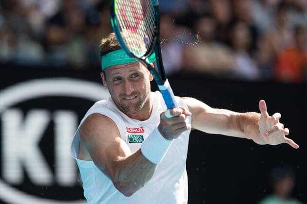 Tennys Sandgren of USA playing Roger Federer of Switzerland in a five set thriller during the Quarter Finals match at the ATP, Tennis Herren Australian Open 2020 at Melbourne Park, Melbourne, Australia on 28 January 2020. Copyright: xPeterxDovganx 26031422