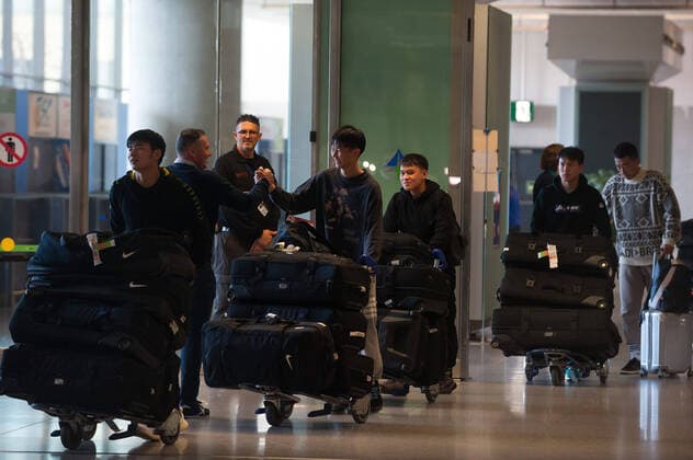 January 29, 2020, Malaga, Spain: Football players at Malaga Costa del Sol airport..Wuhan Zall FC Chinese soccer team arrives at Malaga Costa del Sol airport for a pre-season training in Cadiz province. According to the Andalusia and Spanish government, the players are not infected with the Corona virus and during their stay, they will be subjected to health controls. The team will be in Andalusia until 15 February. Wuhan Zall FC team players in Malaga, Spain - 29 Jan 2020 - ZUMAs197 96526878st Copyright: xJesusxMeridax