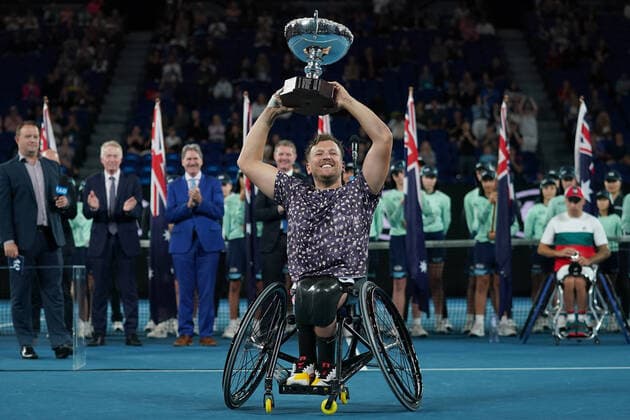 AUSTRALIAN OPEN DAY 13, Dylan Alcott of Australia holds the trophy aloft after winning the men s Quad Wheelchair singles final against Andy Lapthorne of Great Britain on day 13 of the Australian Open tennis tournament at Rod Laver Arena in Melbourne, Saturday, February 1, 2020. ( NO ARCHIVING, EDITORIAL USE ONLY, NO USE IN BOOKS WITHOUT CONSENT MELBOURNE VIC AUSTRALIA  Copyright: xMICHAELxDODGEx 20200201001446064672